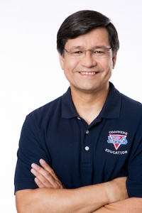 CoachHeadshotFoldedArms-lowRez copy 2